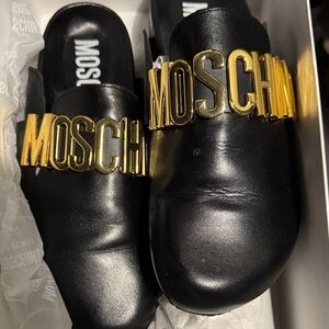 Moschino Black Leather Slip-Ons with Gold Accents